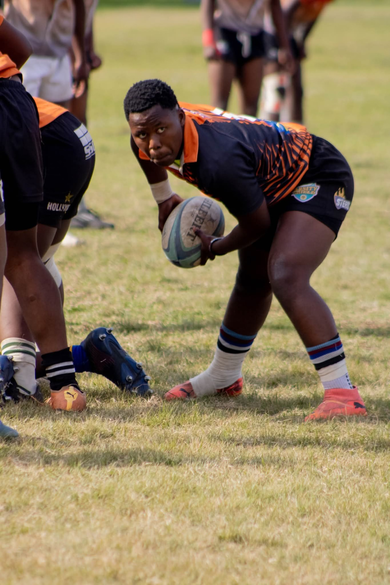 Olutsha Wolves Under-21 scrumhalf about to clear the ball