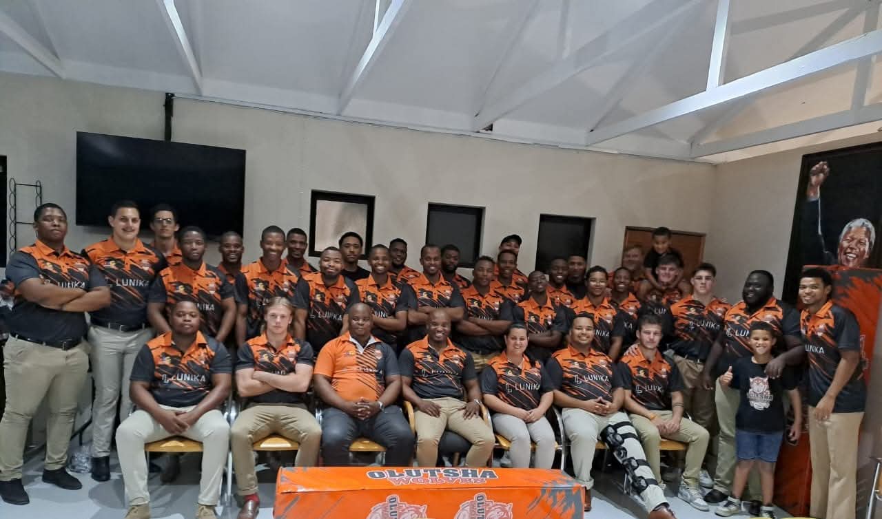 The Olutsha Wolves squad and management at a club function